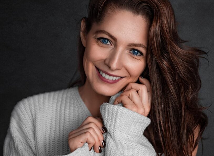 Woman considering facial rejuvenation options in San Antonio